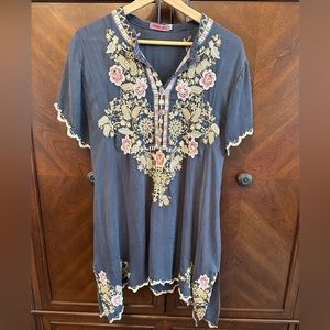 Johnny was silk embroidered tunic. Was an XL but altered to a medium.